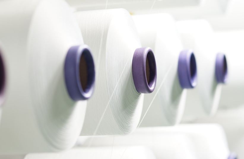 polyester thread being spun