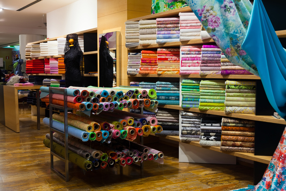Various textiles for sale in fabric shop