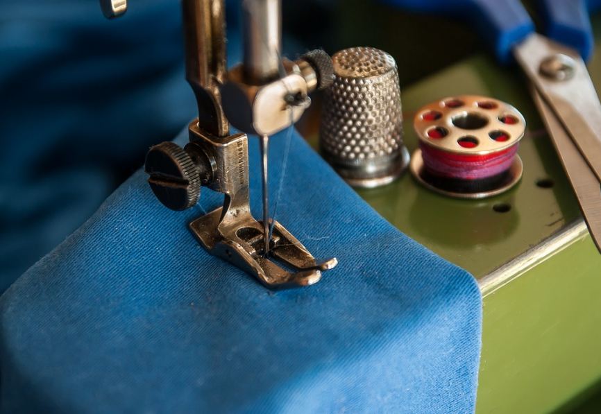 a close-up shot of sewing machine’s presser feet