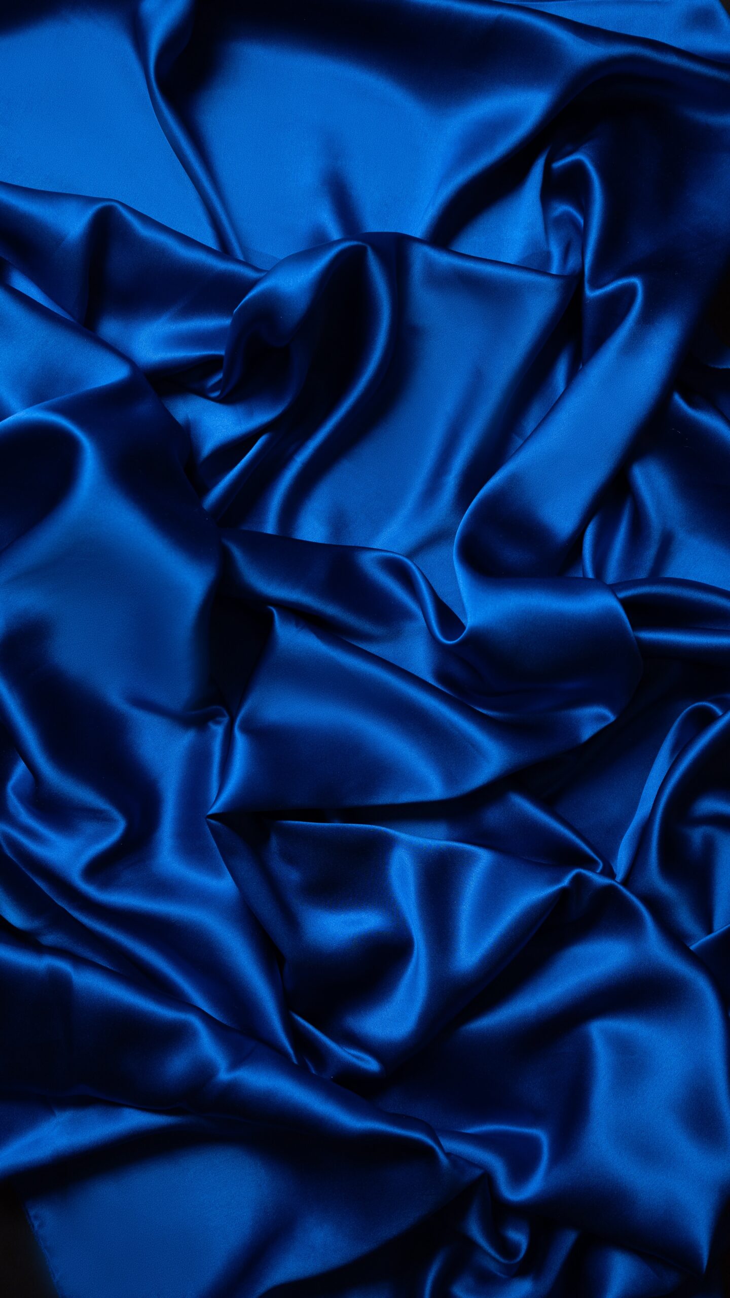A blue silk fabric surface
