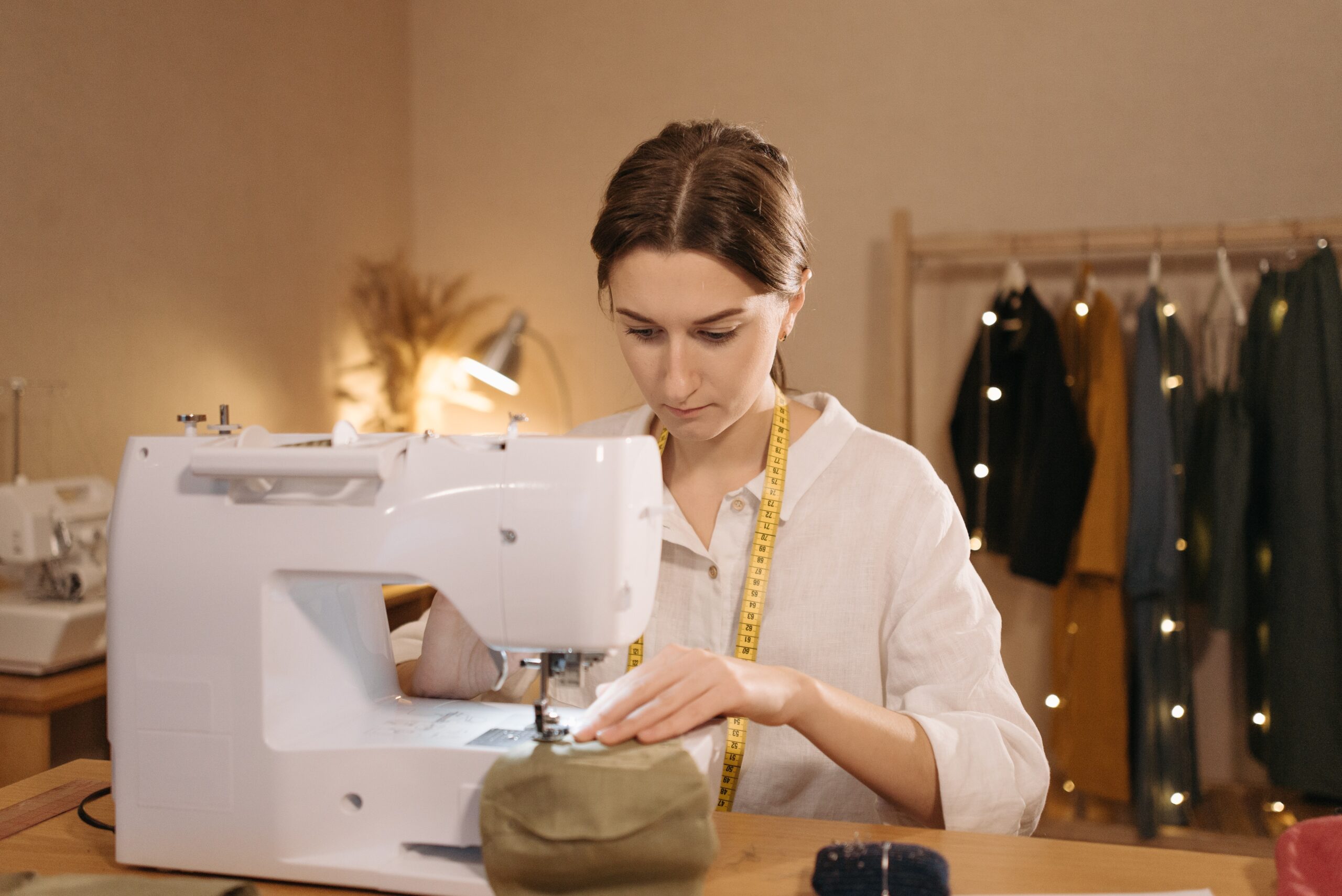 A woman using a sewing machine