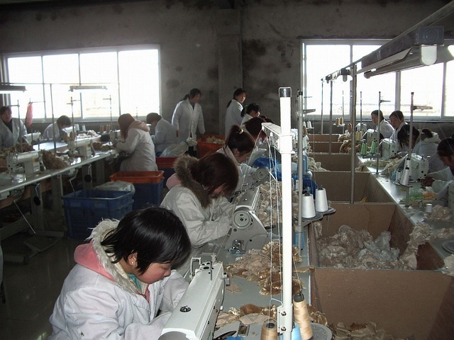 Worker factory sewing machine